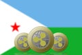 3D ILLUSTRATION Three RIPPLE cryptocurrency with Djibouti flag on background