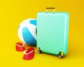 3d Travel suitcase with Beach ball and flip flops. Royalty Free Stock Photo