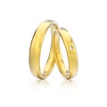 3D illustration two yellow gold classic wedding rings with diamond with reflection