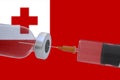 3D Illustration vaccine container bottle accompanied by a syringe with Tonga flag covid19 covid-19 coronavirus