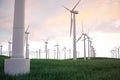 3d illustration, wind turbine with sunset sky. Energy and electricity. Alternative energy, eco or green generators Royalty Free Stock Photo