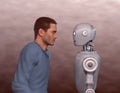 Young man looking very intently at a robot