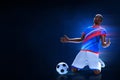 3d illustration young professional soccer player celebration on dark blue backgrounds