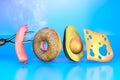 3D illustration with breakfast foods spelling a word `food` on a blue background, 3d rendering
