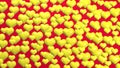 3D image. Festive red background with hearts. Lots of yellow hearts on a red background. Valentine\'s Day.