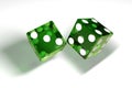 3d image: high quality rendering of transparent green rolling dices with white dots. The cubes in the cast. throws. High resolutio