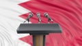 Podium lectern with microphones and Bahrain Flag in background