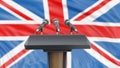 Podium lectern with microphones and British flag in background