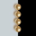 3d image render of gold spheres on white and black background