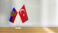 American and Estonian flag pair on a desk over defocused backgroundTurkish and Russian flag pair on a desk over defocused backgrou