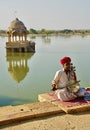 India Rajasthan Jaisalmer Gadi Sagar Tank Musician