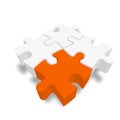 3D jigsaw puzzle pieces. White pieces with one orange highlighted. Team cooperation, teamwork or solution business theme Royalty Free Stock Photo