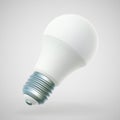 3D LED white light bulb on gray background. Royalty Free Stock Photo