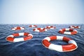 3d life buoys and blue ocean with blue sky