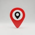 A 3D location pin with a red outer shape and a white circle containing a black map Royalty Free Stock Photo