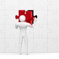 Ã¯Â»Â¿3d man inserting red missing piece in grey puzzle Royalty Free Stock Photo