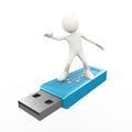 3d man surfing on usb flash drive Royalty Free Stock Photo