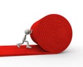 3d man unrolling rolling red carpet Royalty Free Stock Photo