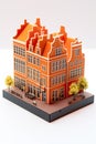 3D miniature of a traditional Holland house, delicately crafted and isolated on a white background