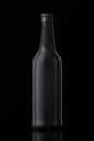 3D model of dark grey beer bottle with cap and label against black background Royalty Free Stock Photo