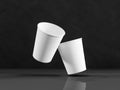 3d model of paper cups on the plane under natural light. Black b