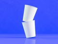 3d model of paper cups on the plane under natural light. Blue ba