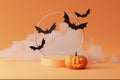 3D pedestal podium with cloud smoke on orange background. Flying bat and pumpkin with frame rim. Halloween Jack o lantern displa