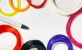 3D pen for drawing three-dimensional objects made of plastic and a lot of multi-colored plastic for creating beautiful Royalty Free Stock Photo
