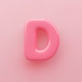 3D Pink uppercase letter D with a glossy surface on a pink background.