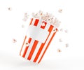 3d popcorn bucket icon with empty label. Realistic render of red and white striped cardboard box full pop corn isolated Royalty Free Stock Photo