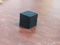 3D printed small black cube Royalty Free Stock Photo