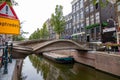 3d printed stainless steel bridge over canal in the red light district of Amsterdam