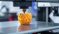 3D Printer Creating Orange Object Royalty Free Stock Photo