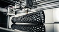 3D Printer Creating Complex Geometric Plastic Object in Close-up Royalty Free Stock Photo