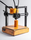 3D Printer Creating a Yellow Spiral Prototype Royalty Free Stock Photo