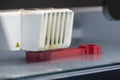 The 3D printer machine  print out the sample model prototype. Royalty Free Stock Photo