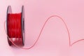 3D Printer Plastic Filament. Spool of red thermoplastic wire for 3D printing close up Royalty Free Stock Photo