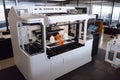 3d printer printing complex design, with view of finished product visible