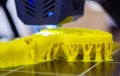 3D printer printing object close-up. Process creating three-dimensional model Royalty Free Stock Photo