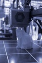 3D printer printing prototype molten plastic Process of creating prototype model Royalty Free Stock Photo