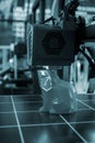 3D printer printing prototype molten plastic Process of creating prototype model Royalty Free Stock Photo