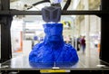3D printer prints object Process of printing model on 3D printer. Model printed Royalty Free Stock Photo