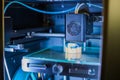 Three dimensional printing machine prints physical 3D model Royalty Free Stock Photo