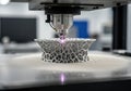 3D printer creating intricate lattice structure with precision laser technology, showcasing advanced manufacturing process and Royalty Free Stock Photo