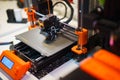 3d printer prototype object machine display orange parts Royalty Free Stock Photo