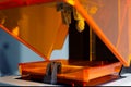 3D printing process. 3D printer for SLA stereolithography printing using photopolymer resin. Royalty Free Stock Photo
