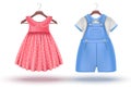 3d realistic set of baby girl and baby boy clothes on a hanger. Pink dress and blue romper. Isolated on white background