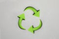 3d recycling-Symbol made with plasticine. Sustainability concept on grey background. Green earth recycle concept Royalty Free Stock Photo