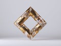 3d render, abstract geometric rhombus shape, gold and crystal glass mosaic pieces, cracked surface with hole. Split object