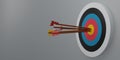 3D render Arrow hit the center of the target on a dartboard on gray background. Minimal target with arrows. Copy space. Business